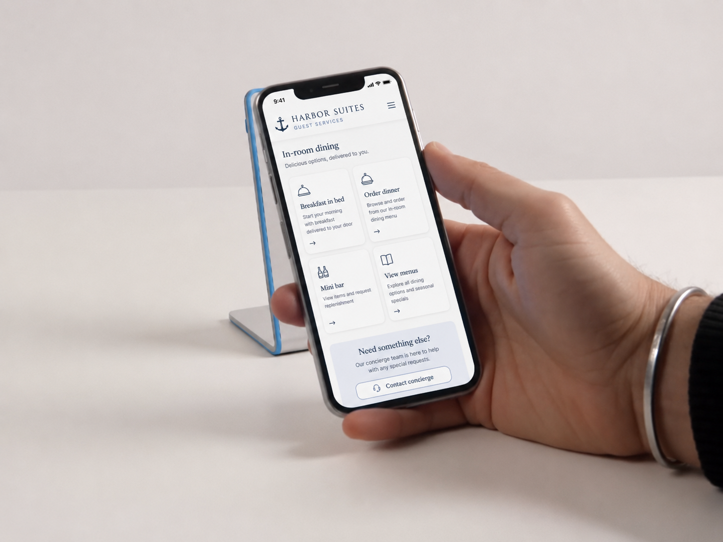 Hotel tap flow showing guest services opening from a room or service zone.